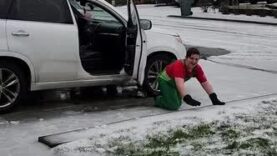 Guy Slips and Falls in His Ice Covered Front Yard While Attempting to Get Inside Car