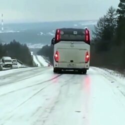 This bus driver has good control of his vehicle on an icy road